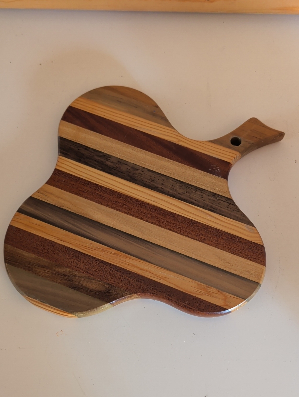 Wooden Striped Paddle Cutting Board - Natural Multiwood.🌟🌟🌟